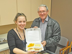 Kelly Coleman (left) and West Perth Mayor Walter McKenzie show off one of several meals that were given out last Wednesday, March 19 as part of the Mayors For Meals event. The day is held during the annual March For Meals campaign, which took place this year between March 17–21. KRISTINE JEAN/MITCHELL ADVOCATE