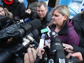 Sheri and Pat Leighton speak to reporters outside the Federal Court building on Sparks St. Monday, March 24, 2014 on the first day of an inquest into the death of their 18 year-old son Eric on May 26, 2011.
DOUG HEMPSTEAD/Ottawa Sun?/QMI AGENCY