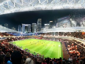 This image courtesy of Miami Beckham United shows an artist rendering of a proposed stadium for a Major League Soccer (MLS) team backed by retired English soccer star David Beckham of the group's preferred location for the arena seated in between Biscayne Bay and downtown Miami, Florida in this handout image released on March 24, 2014. (REUTERS/360 Architecture and Arquitectonica/Handout via Reuters)