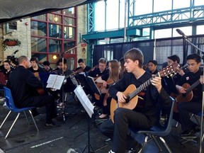 The College Beliveau Guitar Ensemble performs at The Forks recently as part of the Juno "We Speak Music" series that engages and showcases young performers. (Twitter.com)