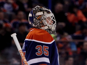 The Oilers sent Viktor Fasth for medical attention after he was injured in a collision with Anton Lander at practice Monday. (David Bloom, Edmonton Sun)