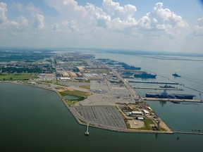 An aerial view of Naval Station Norfolk, Va., the largest naval base in the world in this July 7, 2011 U.S. Navy handout photo obtained by Reuters March 1, 2013. (REUTERS/U.S. Navy/Mass Communication Specialist 1st Class Christopher B. Stoltz/Handout)
