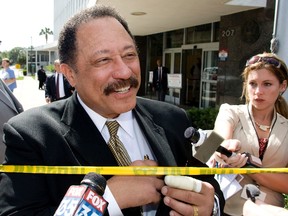 Judge Joe Brown, a television court judge, talks to the media outside the federal court in Ocala, Florida in this April 24, 2008 file photo. REUTERS/Scott Audette/Files
