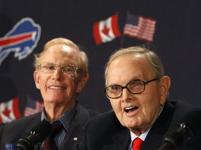 In this 2008 file photo, Buffalo Bills owner Ralph Wilson (right) and president/CEO of Rogers Communications, Ted Rogers, speak to the media about bringing the NFL to Toronto. (REUTERS/Mark Blinch)