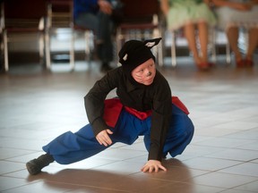 Austin Handy, 8, of Elk Point practices his dance before his group’s performance during the weekend’s Ukrainian Dance Festival held at Lakeland College. The group performed a piece called Kotik’s Mish Dance, and Handy was dressed as a cat, his colleagues were dressed as mice.