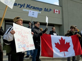 Protesters at Prince Edward-Hastings MP Daryl Kramp's Belleville constituency office Wednesday.
Megan Mattice/For The Intelligencer