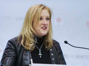 Lisa Raitt, Minister of Transport,  speaks during the Canada Olympic men's hockey roster announcement in Toronto, Ont. on Tuesday January 7, 2014. (Ernest Doroszuk/QMI Agency)