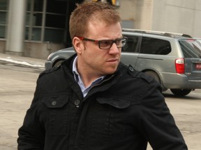 Former Mother Teresa High School shop teacher Scott Day leaves the federal court building downtown Tuesday, March 25, 2014 after testifying on the second day of the Eric Leighton inquest. Day told the court Leighton and his partner Adam Soliman proceeded with the cutting stage of the barrel BBQ without his knowledge or permission, in a forbidden area of the shop class.
DOUG HEMPSTEAD/Ottawa Sun/QMI AGENCY