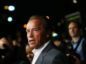 Cast member Arnold Schwarzenegger attends the premiere of "Sabotage" in Los Angeles, California March 19, 2014. (REUTERS/Mario Anzuoni)