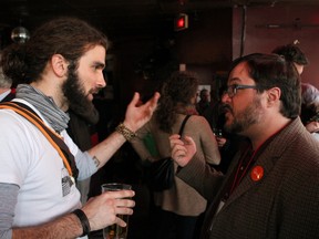Jean-Mathieu Chenier chats with Quebec Solidaire candidate for Hull Benoit Renaud about public transport in the city. Young adults met with various candidates over drinks and snacks to discuss what matters to them on Tuesday, March 25, 2014
JESSIE ARCHAMBAULT/OTTAWA SUN/QMI AGENCY