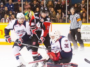 Dalen Kuchmey of the Windsor Spitfires blocks a shot at the net during their game against the Niagara IceDogs earlier this season. (Julie Jocsak/QMI Agency)