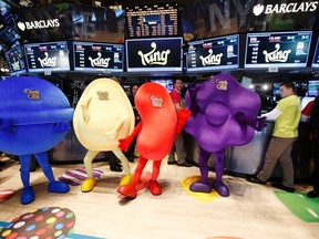Mascots dressed as characters from the mobile video game "Candy Crush Saga" pose during the IPO of Mobile game maker King Digital Entertainment Plc on the floor of the New York Stock Exchange March 26, 2014.  REUTERS/Brendan McDermid