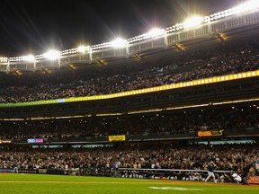 Mariano Rivera #42 of the New York Yankees pitches against the Tampa Bay Rays in the ninth inning during their game on September 26, 2013 at Yankee Stadium in the Bronx borough of New York City. (Al Bello/Getty Images/AFP)