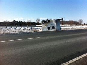 A horse trailer is one of five vehicles standed along Hwy. 401 in Chatham-Kent following crashes during Tuesday evening's snowfall. The OPP will conduct a rolling slowdown of traffic along the westbound lanes to facilitate their removal Wednesday afternoon, starting at about 1 p.m. and lasting three hours. VICKI GOUGH/Chatham Daily News.