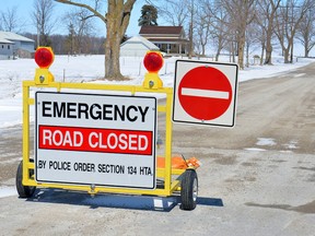Division line at Front Road remained closed throughout the day March 26 after an OPP pursuit ended in a crash which left two London teenagers injured.