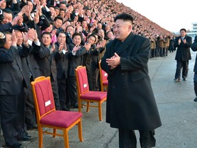 North Korean leader Kim Jong Un visits participants of a national agriculture competition in this undated photo released by North Korea's Korean Central News Agency (KCNA) Feb. 10, 2014. REUTERS/KCNA