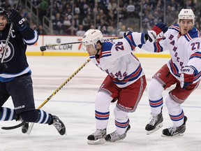 Jets captain Andrew Ladd defended his decision to miss Monday's game to be with his wife and newborn daughter. (Marianne Helm/Getty Images/AFP)