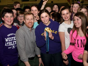 Jon Montgomery, 2010 Vancouver Winter Olympics gold medallist in skeleton gathers with  students in Kingston  on Wednesday March 26 2014 after speaking as part of the Boys and Girls Club of Kingston Making a Difference Speaker Series. 
IAN MACALPINE/KINGSTON WHIG-STANDARD/QMI AGENCY