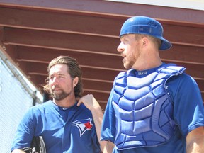 Catcher Erik Kratz (right) caught R.A. Dickey for most of the spring and was solid at the plate, but the Blue Jays decided to go with the sure catching hands of Josh Thole instead. (Veronica Henri/Toronto Sun)