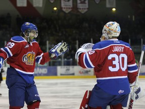 Mitch Moroz and Tristan Jarry celebrate in Prince Albert Wednesday night as the Edmonton Oil Kings swept the Raiders in their opening round WHL playoff with a 6-2 win. Moroz had five points in the game. PERRY BERGSON/Prince Albert Herald