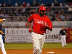 Phillies first baseman Ryan Howard rounds the bases after hitting a home run. (USA TODAY SPORTS)