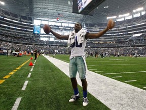 Dallas Cowboys wide receiver Dez Bryant reacts to the fans after the Cowboys beat the St. Louis Rams in their NFL football game in Arlington, Texas September 22, 2013. (REUTERS/Mike Stone)