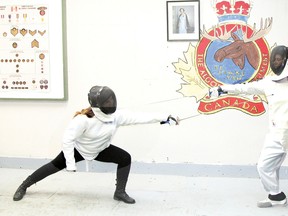 A Sergeant, and Officer of the Royal Canadian Army Cadets 1635 division in a fencing demonstration. Fencing is set to begin for the cadets at the beginning of April after a two-year journey to introduce it. 
Times photo by Kyle Lincez
