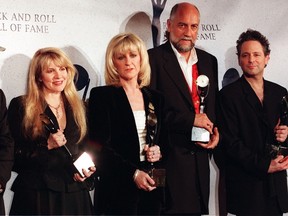 Members of the British rock group Fleetwood Mac, John McVie, Stevie Nicks, Christine McVie, Mick Fleetwood and Lindsay Buckingham appear together after receiving their awards and being inducted into the Rock and Roll Hall of Fame in this January 12, 1998 file photo in New York. AFP PHOTO/JON LEVY
