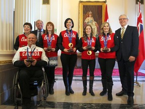 Jennifer Jones' team, as well as Paralympian Ron Thiessen, have been inducted into the Order of the Buffalo Hunt by Premier Greg Selinger. (WINNIPEG SUN PHOTO)