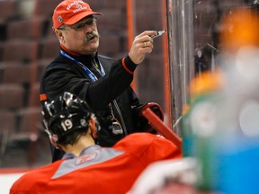 Ottawa Senators head coach Paul MacLean draws up drills for his players at a recent practice. Errol McGihon/Ottawa Sun