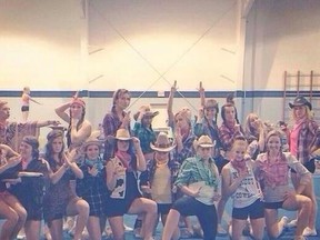 The photo of the University of Regina's cheer team dressed up for a theme night on Thursday, March 13, 2014, was tweeted out by people offended by the Cowboys and Indians theme. The school has apologized. (Photo: Twitter/QMI Agency)