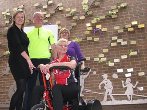 The Chatham-Kent Cycling Festival, set for June 21, will help raise money so the Chatham-Kent Children's Treatment Centre can purchase more adapted bicycles – for children who are unable to operate a conventional bicycle. Seated on an adapted bicycle is Ann McKenzie, who works at the Treatment Centre and who is a member of the Chatham-Kent Cycling Group. Standing are Tina Furlan (left) and Rand MacIntosh. Furlan represents TekSavvy, who is a corporate sponsor of the festival. MacIntosh represents Campbell Toyota, another corporate sponsor. He's also a member of the Cycling Group. To the right is Shauna Jackson, a physical therapist's assistant with the Treatment Centre.