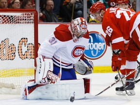 Canadiens goalie Carey Price makes a save on Red Wings right wing Tomas Jurco during first period action in Detroit on Thursday, March 27, 2014. (Rick Osentoski/USA TODAY Sports)