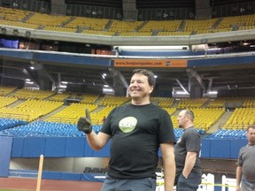Ten years after he worked the Expos’ final game in Montreal, Pierre Vezina helps get Olympic Stadium ready for the Jays-Mets exhibition series. (Manny Medeiros, photo)