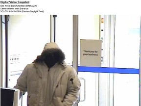 Ottawa Police released this image of a suspect in a robbery at a Bank St. bank on Feb. 21. (OTTAWA POLICE submitted image)