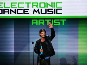 Avicii accepts the favorite electronic dance music artist award at the 41st American Music Awards in Los Angeles.

REUTERS/Lucy Nicholson