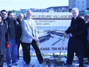 Spruce Grove Mayor Stuart Houston (left) stands with Terry Williams, CEO of Tri Village Developments, during the ground breaking ceremony of the village’s Phase 2 development on March 20. - Karen Haynes, Reporter/Examiner