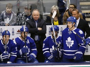 Leafs coach Randy Carlyle behind the bench at the Air Canada Centre on March 3, 2014. (Michael Peake/Toronto Sun)