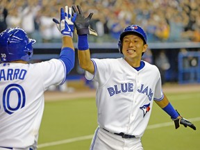 Steve Simmons is lot less excited than Jays shortstop Munenori Kawasaki for the coming season. (USA TODAY SPORTS)