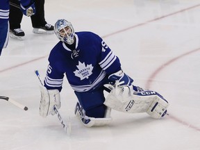 Maple Leafs goalie Jonathan Bernier reacts after letting in a goal at the ACC on Saturday night. Bernier faced 28 shots in the loss.  (STAN BEHAL/Toronto Sun)