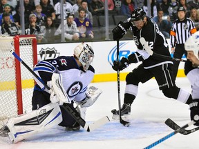 Los Angeles Kings right wing Marian Gaborik (12) shoots on goal against Winnipeg Jets goalie Ondrej Pavelec (31) during the first period at Staples Center. (Gary A. Vasquez-USA TODAY Sports)