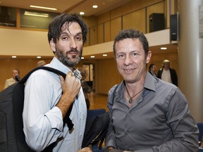 A handout picture obtained on December 11, 2013 shows Spanish freelance photographer Ricardo Garcia Vilanova (L) and El Mundo daily newspaper correspondent Javier Espinosa during the XI Miguel Gil Moreno Journalism Award held at the Bertelsmann headquarters in Barcelona on May 24, 2012. The two journalists taken hostage by an Al-Qaeda-linked group last year have been freed, the Spanish daily El Mundo reported on March 30, 2014.    AFP PHOTO/ PRH/ JOAN BORRAS