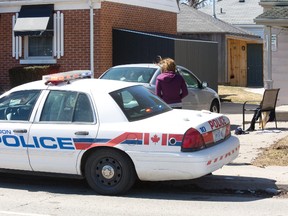 A man was rushed to Victoria Hospital after being stabbed on Gammage St. near Oxford St. in London on Sunday March 30, 2014. Police have arrested two males in relation in the incident. DEREK RUTTAN/The London Free Press/QMI Agency