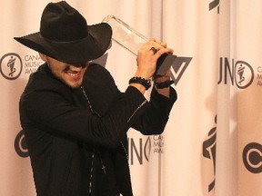 Breakthrough artist of the year winner Brett Kissel with the Juno award backstage during the JUNO Gala Dinner and Awards at the RBC Convention Centre in Winnipeg, Man., on Sat., March 29, 2014. Kevin King/Winnipeg Sun/QMI Agency