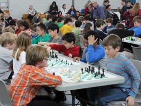 More than 140 students from grades 1 through 12 from the Limestone, Algonquin, Hastings and Prince Edward and Upper Canada school boards competed in the Eastern Ontario Chess Challenge at HMCS Cataraqui on Sunday. Julia McKay/The Whig-Standard