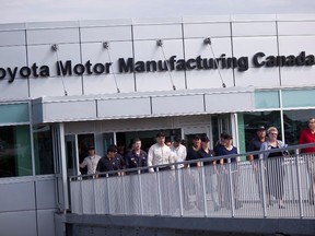 Employees at the Toyota assembly plant in Woodstock, Ontario, are in shown in this August 5, 2011 file photo. (REUTERS/Geoff Robins/Files)