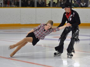 The Battle of the Blades event featured area hockey players paired up with local figure skaters, an idea mirrored from the CBC television series, including Anita Young (above, left) doing a spin with Kevin Quipp. ANDY BADER/MITCHELL ADVOCATE