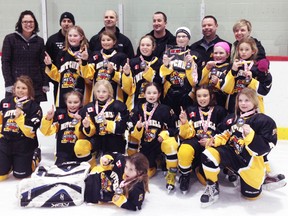 Mitchell’s Atom girls hockey team won the Western Ontario Girls Hockey League (WOGHL) Atom C/HL championship with an exciting win in overtime over St. Clair March 23. Back row (left): Coaching staff JoAnn Horan, Jody Catalan, Pete Price, Jamie Gethke (head coach), Rob Dearing, Lisa Gibbings. Second row (left): Erica Pletsch, Jaimie Badley, Taya Cornish, Maggie Price, Ava Gibbings, Arianna Catalan. Front row (left): Maggie Phillips, Emma French, Brooklyn Gethke, Emily Dearing, Emily Haefling, Hannah Elliott. Laying in front is Makayla Beuerman. Absent was Denny Horan (coaching staff) SUBMITTED PHOTO