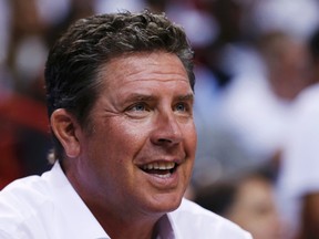 Former Miami Doilphins quarterback Dan Marino watches the Miami Heat play the San Antonio Spurs during Game 1 of their NBA Finals basketball playoff game in Miami, Florida June 6, 2013. (REUTERS/Mike Segar)