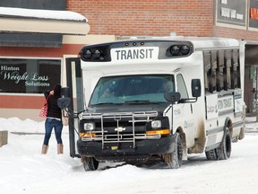 A Hinton Transit bus waits by the stop outside the Athabasca Hotel Inn and Suites in Old Drinnan Town March 27. This is one of the more popular stops, averaging about 600 riders per month.